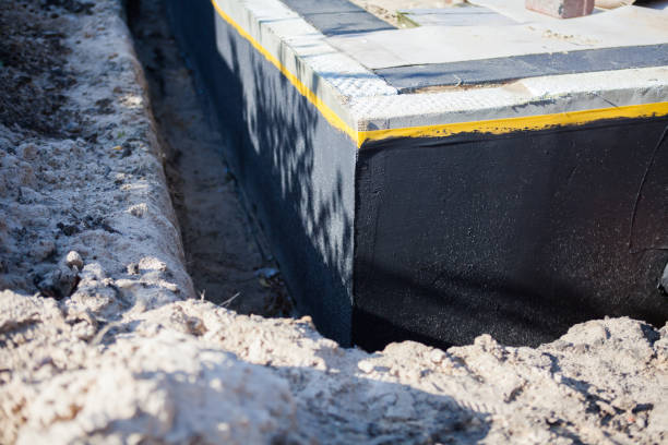 Professional Interior Drainage System technician working in Oneonta, AL